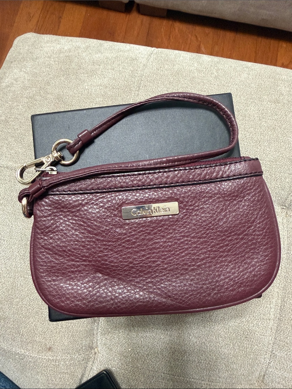 Calvin Klein Burgundy Leather Wristlet Clutch with Gold Accents